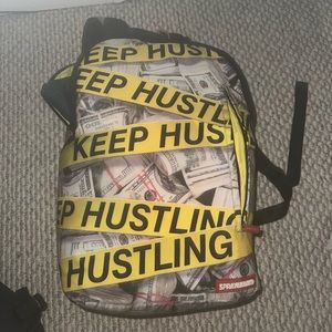Spray ground “keep hustling” backpack